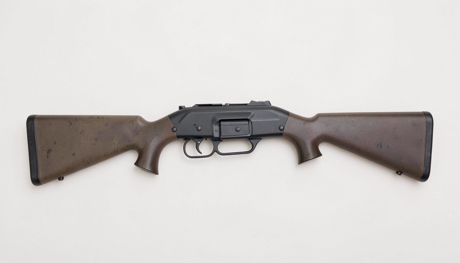 A Browning Gold Hunter 12 gauge semi-auto shotgun with dark synthetic stock and matte black receiver, displayed horizontally on a light background